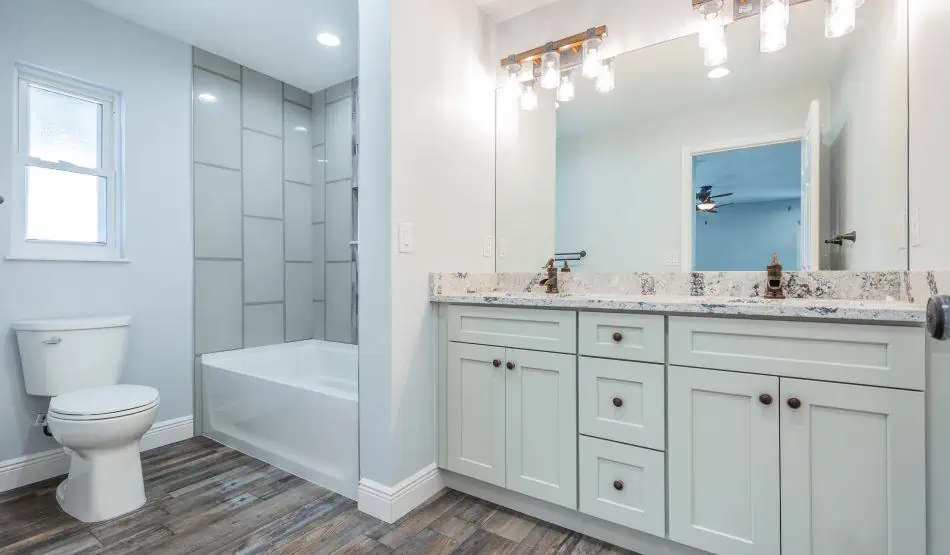A newly remodeled bathroom by Build America Constructions