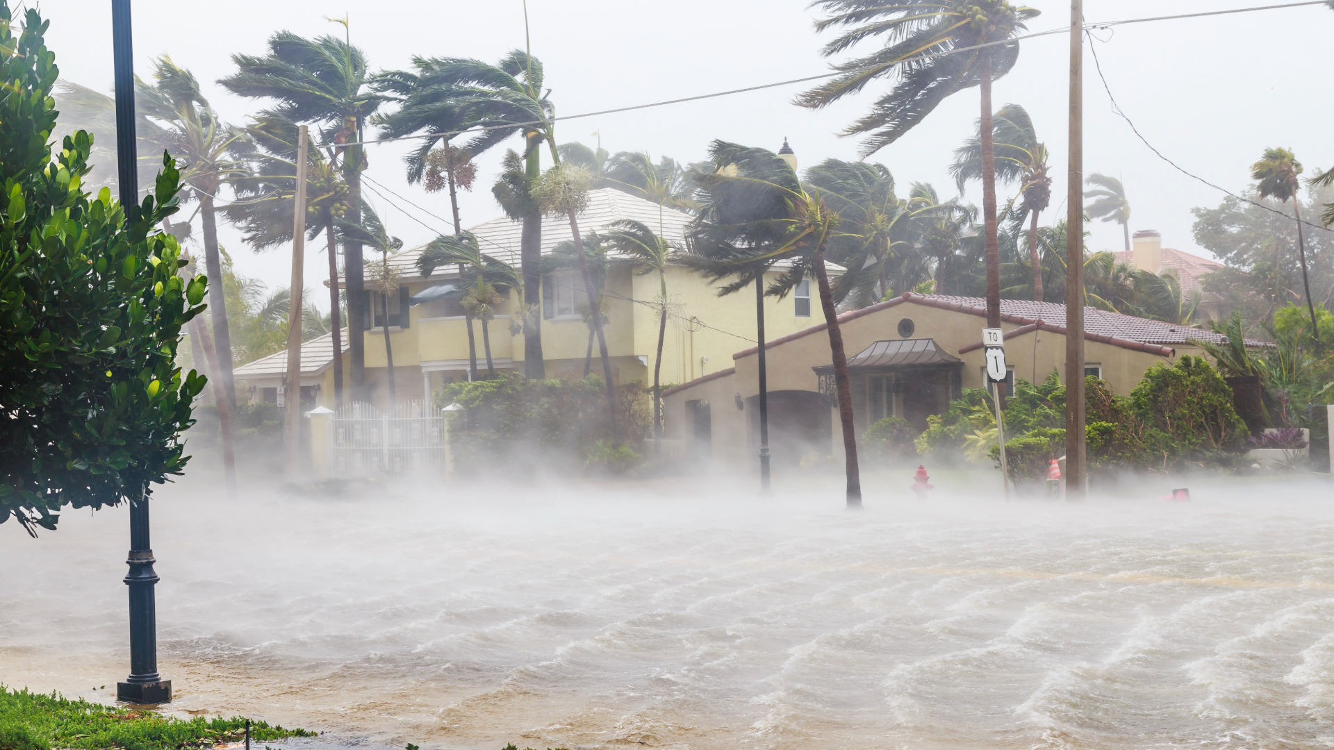 Severe hurricane winds and storm surge flooding impact coastal homes